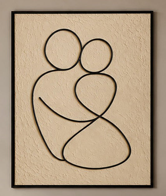 The image is a framed artwork depicting two abstract figures embracing each other.
