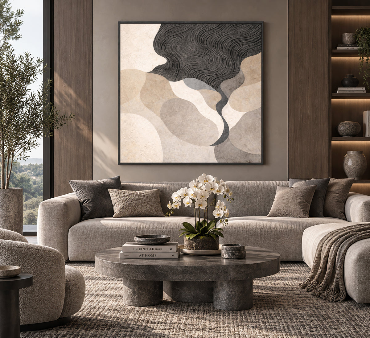 a modern living room with a large abstract painting on the wall, a gray sofa, a round coffee table with a vase of white flowers, and a bookshelf with various decorative items.