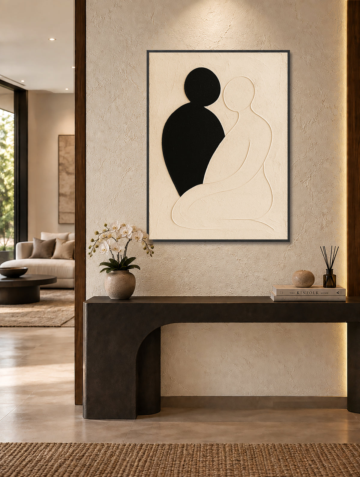 a modern living room with a large abstract painting hanging on the wall, a wooden console table with a vase of flowers, and a book titled "The Kinex" on the table.