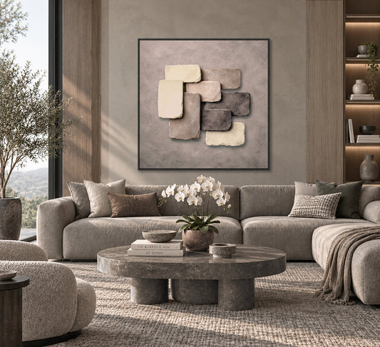 a modern living room with a large abstract painting on the wall, a gray sofa, a round coffee table, and a large window overlooking a scenic outdoor view.